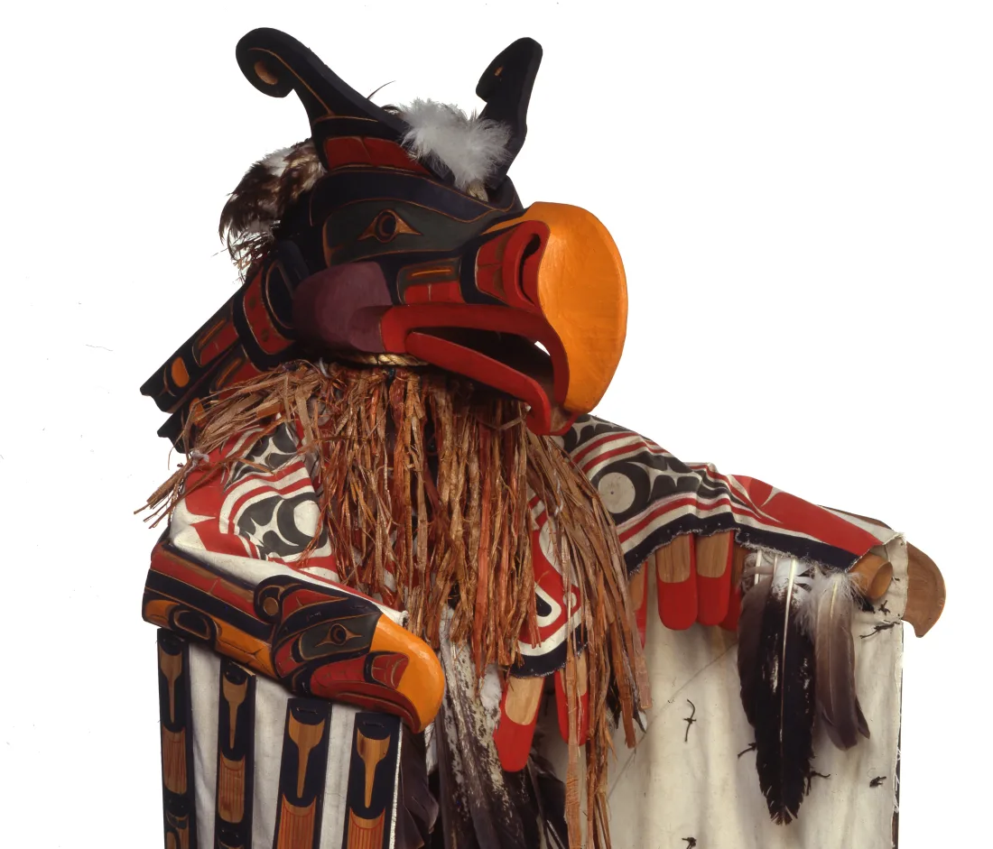 Costume and mask representing a thunderbird with red and yellow beak