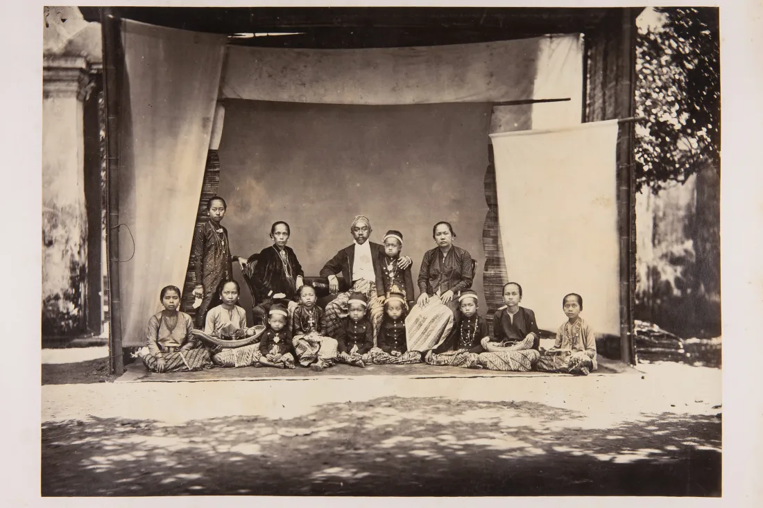 Album with studio portraits, city views and landscape photographs from Singapore, 1868