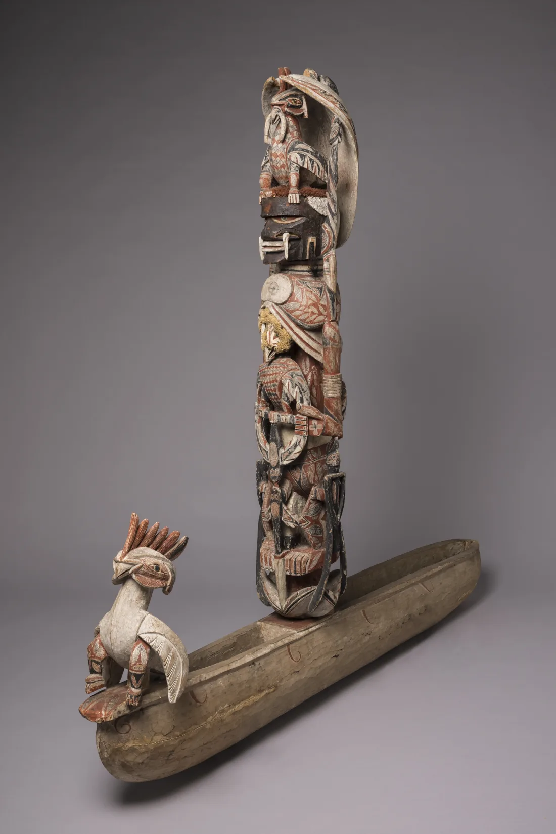 Boat with sculptural column 